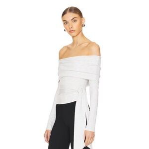 Revolve more to come top